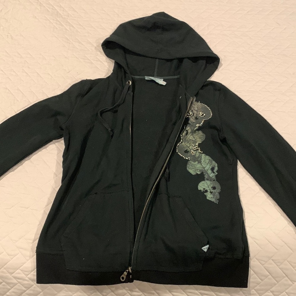 Black sweatshirt with some skulls size medium